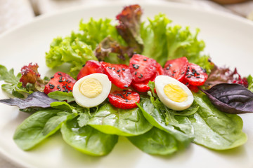 Fresh tasty salad on plate, closeup