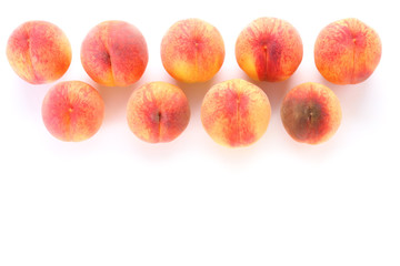 Ripe peaches on white background