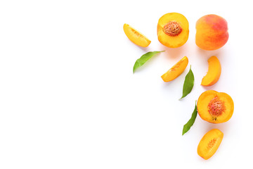 Ripe peaches on white background