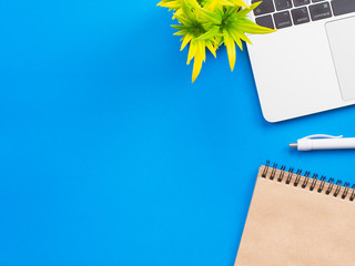 Minimal workspace - creative flat lay of your desktop. Office table top view with laptop. View from above. Place for your text.