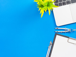 Minimal workspace - creative flat lay of your desktop. Office table top view with laptop. View from above. Place for your text.