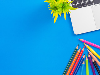 Minimal workspace - creative flat lay of your desktop. Office table top view with laptop. View from above. Place for your text.