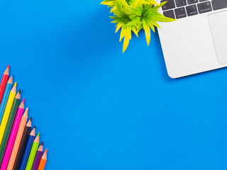 Minimal workspace - creative flat lay of your desktop. Office table top view with laptop. View from above. Place for your text.