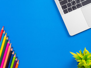 Minimal workspace - creative flat lay of your desktop. Office table top view with laptop. View from above. Place for your text.