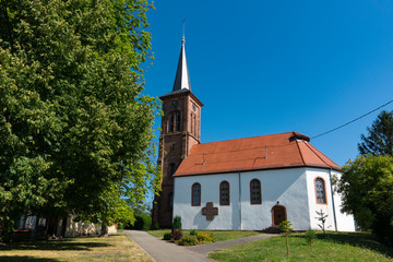Fototapeta na wymiar white church of Hunspach, France