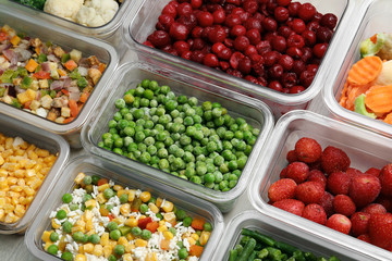 Boxes with different products as background, above view