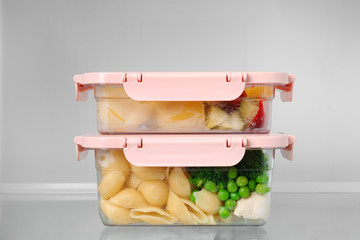 Boxes with prepared meals inside of refrigerator