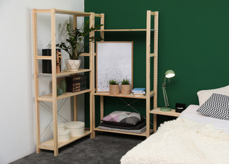 Wooden storage in stylish bedroom. Idea for interior design
