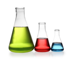Erlenmeyer flasks with color liquids isolated on white. Solution chemistry