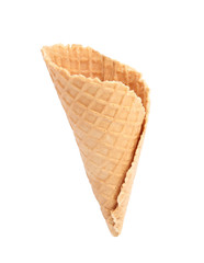 Empty wafer ice cream cone on white background