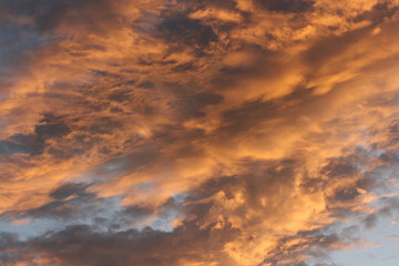 Naklejka na ściany i meble sunset with brown clouds 