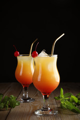 Just made appetizing cocktails Sex on the Beach, black background