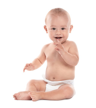 Cute little baby sitting on white background