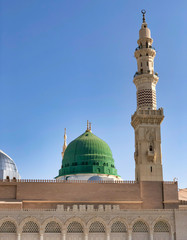 Fototapeta na wymiar Medina, Saudi Arabia - March 22, 2018 : Exterior view of Nabawi Mosque (Prophet Mosque) building in Medina. Selective focus