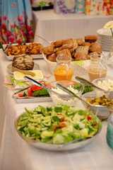 Salad bowl in catering service. Fun party with friends.