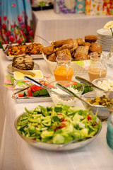 Salad bowl in catering service. Fun party with friends.