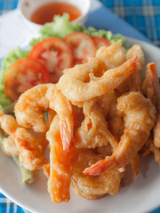 Fried shrimp ball with sweet sauce.