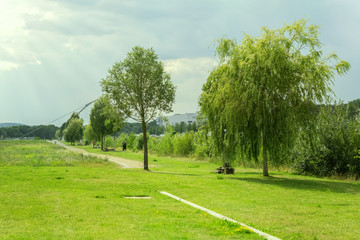 The small park of a German city on a cloudy summer day