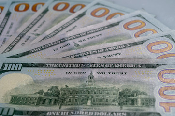 Fototapeta na wymiar Macro photo of one hundred dollars. Reverse side of American 100 dollars.