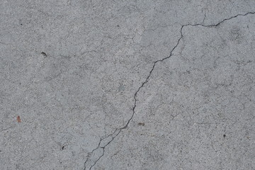 Obraz premium Cracks on the concrete surface of a house in Los Angeles