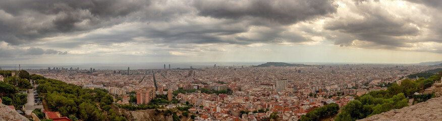 Fototapeta na wymiar Panoramic view of Barcelona under rain clouds