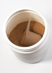Photo of open full tin with a spoon