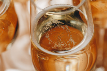 Champagne glasses on table closeup.