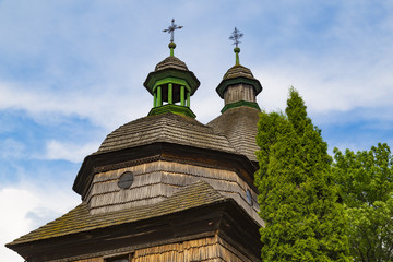 Fototapeta na wymiar Wooden Holy Trinity Church outdoor. City Zhovkva, Ukraine