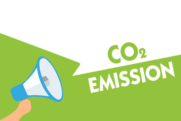 Word writing text Co2 Emission. Business concept for Releasing of greenhouse gases into the atmosphere over time Megaphone loudspeaker speech bubbles important message speaking out loud