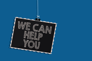 Writing note showing We Can Help You. Business photo showcasing Support Assistance Offering Customer Service Attention Hanging blackboard message communication information blue background