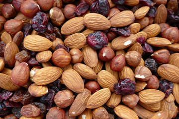 special mixture of healthy nuts raw nuts, hazelnuts, almonds and raisins,