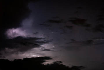 Night clouds thunderstorm, light power in the sky, latin america, long exposure.