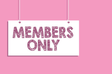 Conceptual hand writing showing Members Only. Business photo text Limited to an individual belongs to a group or an organization Hang board communicate information open close sign pink background