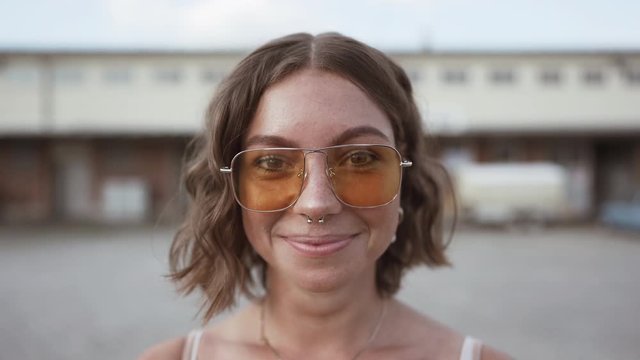 closeup of a young woman. smiling. 4k