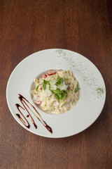 .pasta with chopped beefsteak and tomato