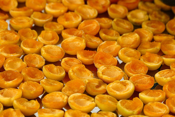 drying the ripe apricots in the sun, making dried fruits, apricot drying at home,