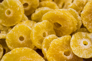 soft focus canned pineapple circle slices tropic fruit food on supermarket counter  