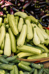 Plenty vegetables of various kind on the market counter.