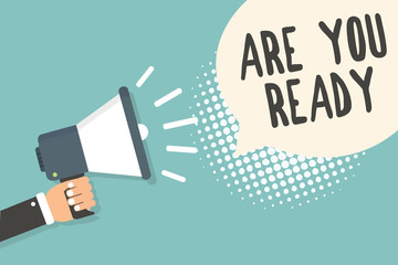 Handwriting text Are You Ready. Concept meaning Alertness Preparedness Urgency Game Start Hurry Wide awake Man holding megaphone loudspeaker speech bubble blue background halftone