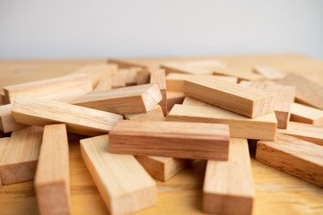 Wood block pile with architecture model, Concept Risk of management and strategy plan, growth business success process and team work
