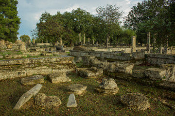 Greece ancient city stone ruins UNESCO heritage touristic destination in Peloponnese peninsula south Europe, park outdoor natural environment  