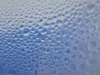 water drops on blue surface