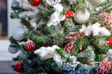brightly and beautifully decorated Christmas tree branches