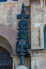 Close Up of the Two Giant Columns in Bronze installed on the Facade of the Government Palace in the...