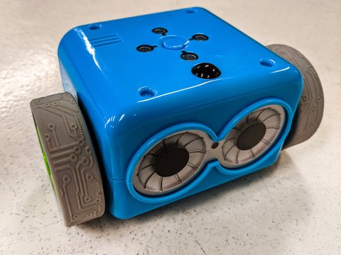 An Illustrative Editorial of a programmable robot called Botley. The Botley is programmable and uses a remote control for sending code and programming.