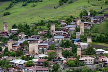 Fototapeta na wymiar Skyline of Mestia, Georgia, where Medieval battle towers still stand throughout the city