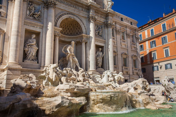 Tourists at the Trevi Fountain designed by Italian architect Nicola Salvi and completed by Giuseppe Pannini  in 1762