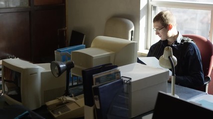 Police officer in precinct solving crimes