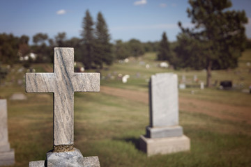 Cross grave marker at rural cemetary
