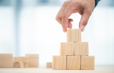 hand stack woods block step on table. business development Decide and choose concept.copy space.
